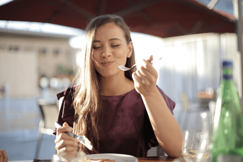 a woman dining at a restaurant