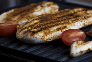 Chicken breast on a grill